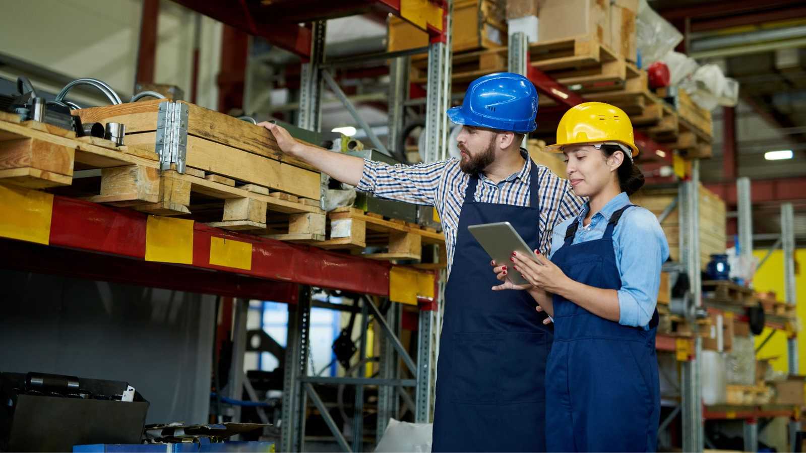 man and woman working in warehouse